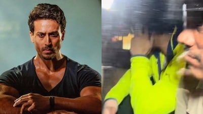 Tiger Shroff Spotted For First Time After Juhu Firing, Sits In Police Car With Bandage On Hand, Covers Face.