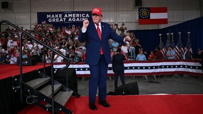 US President Donald Trump dances after speaking at a midterm campaign rally at Dalton Municipal Airport in Dalton, Georgia on October 16. (AFP photo)