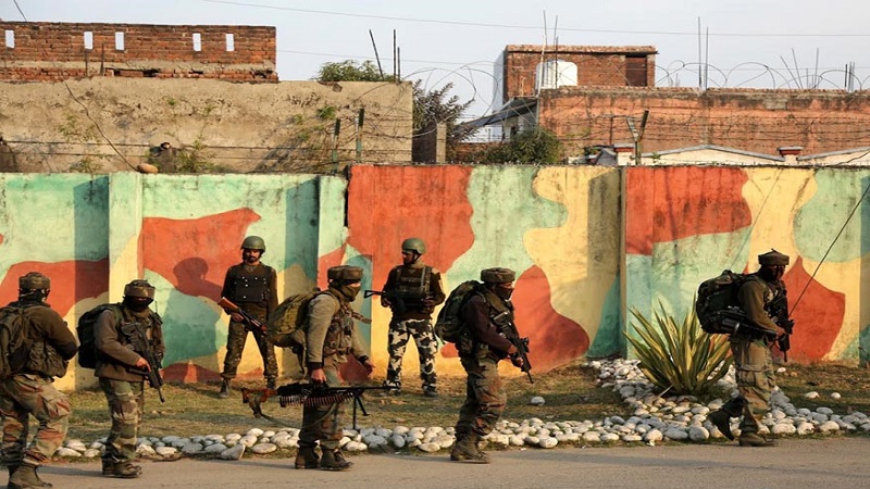 Indian Army soldiers surround Sunjwan Army camp in Jammu, India, Saturday, Feb.10, 2018. A group of militants in Indian Kashmir opened fire Saturday inside an army camp in the disputed region, police said. The attack began early in the morning and it was unclear how many gunmen were involved, (AP Photo/Channi Anand)