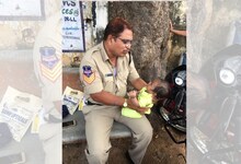 पोलीस अधिकाऱ्याचा हा फोटो तुमचं ह्रदय जिंकून घेईल!