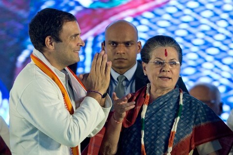 Congress party President Rahul Gandhi, left, and his mother Sonia Gandhi attend an election campaign rally at Medchal, on the outskirt of Hyderabad, India, Friday, Nov. 23, 2018. Elections in Telangana state will be held in December. (AP Photo/Mahesh Kumar A.)