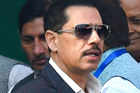 **FILE** New Delhi:  In this file photo dated Dec 16, 2017, is Congress leader Sonia Gandhis son-in-law Robert Vadra, in New Delhi. Vadra and former Haryana chief minister Bhupinder Singh Hooda were booked on Saturday by Haryana Police for alleged irregularities in land deals in Gurgaon. An FIR against Vadra, Hooda and two companies - DLF and Onkareshwar Properties - has been registered at Kherki Daula police station in Gurgaon, Manesar Deputy Commissioner of Police Rajesh Kumar told PTI.
(PTI Photo/Vijay Verma) (Story No. DEL41) (PTI9_2_2018_000115B)