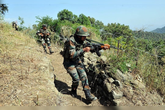 JAMMU, INDIA - OCTOBER 10: Indian army soldiers take position near the Line of Control on October 10, 2016 in Nowshera sector, about 145 km from Jammu, India. (Photo by Nitin Kanotra/Hindustan Times via Getty Images)