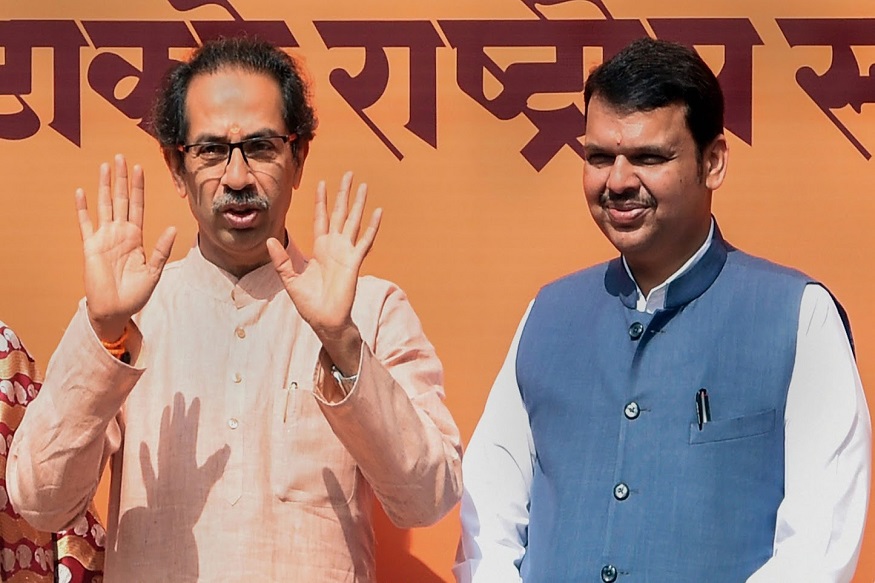 Mumbai: Shiv Sena Chief Uddhav Thackeray and Maharashtra Chief Minister Devendra Fadnavis arrive for the rituals marking the start of the construction of a memorial for Shiv Sena founder Bal Thackeray in Dadar, Mumbai, Wednesday, Jan. 23, 2019. (PTI Photo/Shashank Parade) (Story no BOM4)(PTI1_23_2019_000115B)