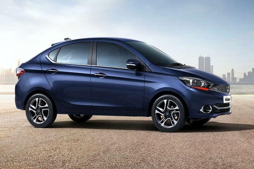 Tata Tigor हे मॉडेल मारुती सुझुकी डिझायर, होंडा अमेझ आणि फोर्ड एस्पॉलरला टक्कर देण्यासाठी बाजारात आणलं होतं. या कारचा खपही चांगला झाला तसेच लोकांकडून याबद्दल चांगल्या प्रतिक्रिया आल्या. या कारवर आता 60 हजार रुपयांपर्यंत डिस्काउंट देण्यात येत आहे. Tata Tigor हे मॉडेल मारुती सुझुकी डिझायर, होंडा अमेझ आणि फोर्ड एस्पॉलरला टक्कर देण्यासाठी बाजारात आणलं होतं. या कारचा खपही चांगला झाला तसेच लोकांकडून याबद्दल चांगल्या प्रतिक्रिया आल्या. या कारवर आता 60 हजार रुपयांपर्यंत डिस्काउंट देण्यात येत आहे.