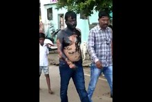 अजितदादांना पाठिंबा, कार्यकर्त्यांनी तोंड काळ करून उमेदवाराची काढली धिंड