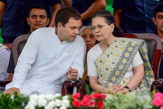 Bengaluru: AICC President Rahul Gandhi with his mother and Congress leader Sonia Gandhi during the swearing-in ceremony of JD(S)-Congress coalition government, in Bengaluru, on Wednesday. (PTI Photo/Shailendra Bhojak)(PTI5_23_2018_000138B)