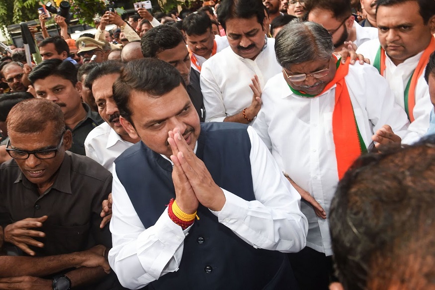Mumbai: Newly sworn-in Maharashtra Chief Minister Devendra Fadnavis arrives at state's BJP office, in Mumbai, Saturday, Nov. 23, 2019. In a stunning turn of events early morning, Fadnavis and NCP leader Ajit Pawar took oath as the Chief Minister and Deputy Chief Minister, respectively. (PTI Photo/Shashank Parade)(PTI11_23_2019_000196B) *** Local Caption ***