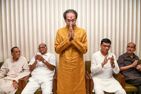 Mumbai: Shiv Sena President Uddhav Thackeray gestures after he was chosen as the nominee for Maharashtra chief minister's post by Shiv Sena-NCP-Congress alliance, during a meeting in Mumbai, Tuesday, Nov. 26, 2019. NCP chief Sharad Pawar and other leaders are also seen. (PTI Photo)  (PTI11_26_2019_000222B)