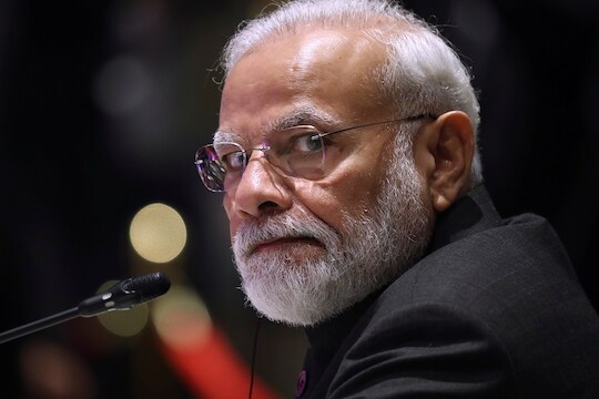 India's Prime Minister Narendra Modi looks on at the ASEAN-India Summit on the sideline of the 35th ASEAN Summit in Bangkok, Thailand November 3, 2019. REUTERS/Athit Perawongmetha - RC17CE7A4750