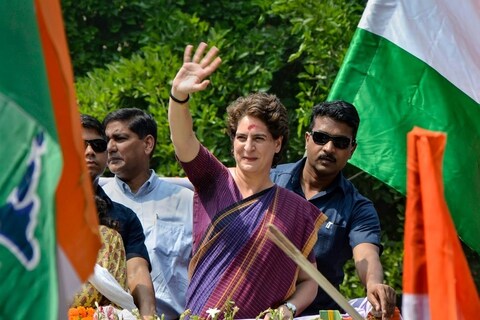 Silchar: Congress General Secretary Priyanka Gandhi takes part in a roadshow, during the ongoing general elections, at Silchar, Assam, Sunday, April 14 2019. (PTI Photo)(PTI4_14_2019_000093B)