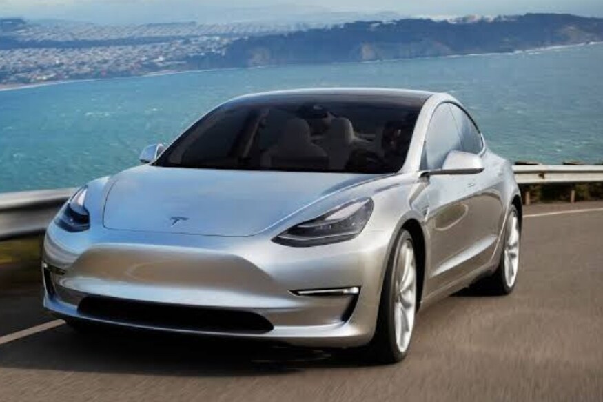 Tesla Model 3 (टेस्ला मॉडेल 3)- या कारची किंमतही 27 लाखांपेक्षा जास्त आहे. शानदार लूक असलेल्या या कारमध्ये दमदार फिचर्स आहे. Tesla Model 3 (टेस्ला मॉडेल 3)- या कारची किंमतही 27 लाखांपेक्षा जास्त आहे. शानदार लूक असलेल्या या कारमध्ये दमदार फिचर्स आहे.