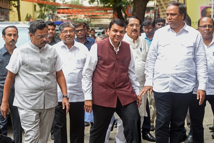 Mumbai: Maharashtra Chief Minister Devendra Fadnavis along with other BJP legislators arrives to attend a meeting on the Maratha reservation issue, at the party office in Mumbai on Thursday, August 2, 2018. (PTI Photo/Shashank Parade) (PTI8_2_2018_000146B)