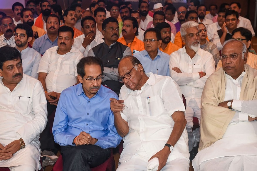 Mumbai: Senior Congress leader Mallikarjun Kharge, NCP chief Sharad Pawar and Shiv Sena President Uddhav Thackeray along with NCP, Congress and Shiv Sena MLAs during a gathering to display their strength of 162, at Grand Hyatt Hotel in Mumbai, Monday, Nov. 25, 2019. (PTI Photo/Mitesh Bhuvad) (PTI11_25_2019_000248B)
