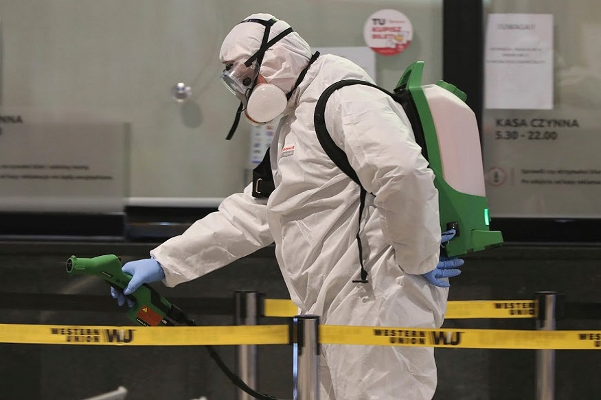 Sanitary workers disinfect the Warszawa Zachodnia (Warsaw Western) coach station at the end of the day in a new routine intended to fight the spread of the coronavirus, in Warsaw, Poland, Wednesday, March 25, 2020. For most people, the new coronavirus causes mild or moderate symptoms, such as fever and cough that clear up in two to three weeks. For some, especially older adults and people with existing health problems, it can cause more severe illness, including pneumonia and death. (AP Photo/Czarek Sokolowski)