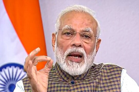 **EDS: VIDEO GRAB** New Delhi: Prime Minister Narendra Modi gestures as he addresses the nation on coronavirus pandemic, in New Delhi, Tuesday, March 24, 2020. (DD NEWS/PTI Photo) (PTI24-03-2020_000366B)