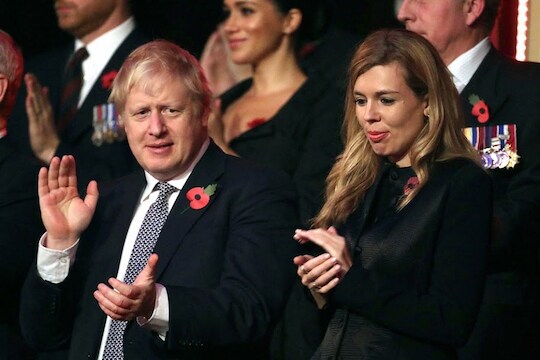 London: Britain's Prime Minister Boris Johnson , left and Carrie Symonds attend the annual Royal British Legion Festival of Remembrance, at the Royal Albert Hall in Kensington, London, Saturday, Nov. 9, 2019. AP/PTI(AP11_10_2019_000002B)