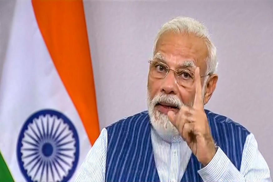 **EDS: VIDEO GRAB** New Delhi: Prime Minister Modi interacts with citizens of Varanasi amid nationwide lockdown, in the wake of coronavirus outbreak, via video conferencing, in New Delhi, Wednesday, March 25, 2020. (DD NEWS/PTI Photo)(PTI25-03-2020_000219B)