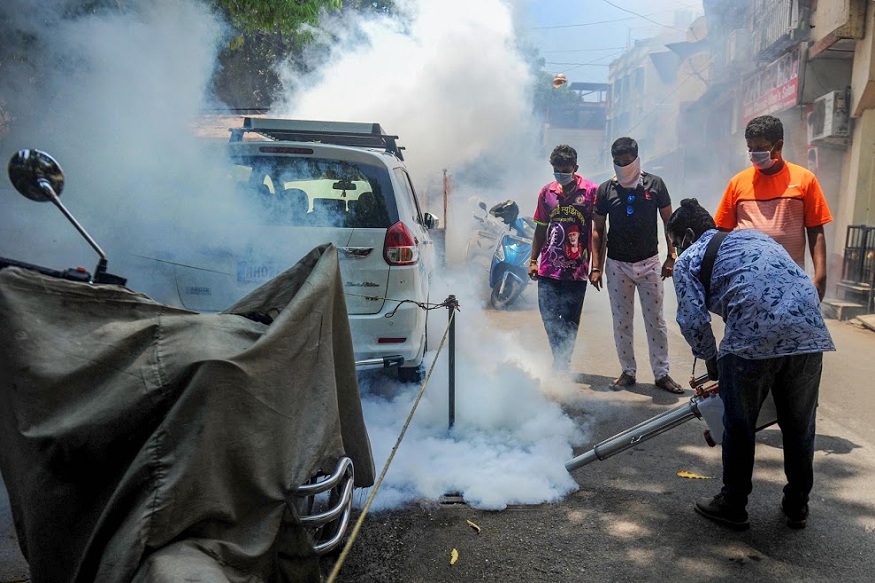 Mumbai: Residents of Khar during a fumigation drive to prevent the spread of coronavirus during the nationwide lockdown, in Mumbai, Monday, April 6, 2020. (PTI Photo)(PTI06-04-2020_000148B)