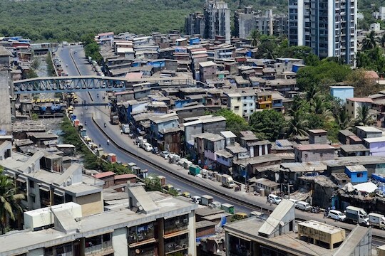 Mumbai: An aerial view of Dr. Baliga Nagar during a nationwide lockdown in the wake of coronavirus pandemic, at Dharavi in Mumbai, Saturday, April 4, 2020. Dr. Baliga Nagar has been declared as a containment area after three cases of coronavirus positive are found. (PTI Photo)(PTI04-04-2020_000221B)