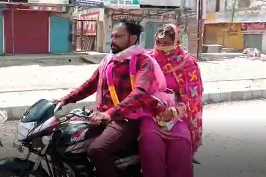 लग्न करून बायकोला बाईकवर घेऊन जात होता, पोलिसांनी दिलं असं गिफ्ट जे आयुष्यभर नाही विसरणार