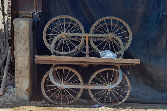 Thane: Carts chained near the residence of a hawker during ongoing COVID-19 lockdown, in Thane, Thursday, April 16, 2020. The 40-day country-wide lockdown may prevent the spread of coronavirus, but the measure would bring a "financial epidemic" on five crore families of hawkers and those who supply them with products, an official of the national hawkers' body said. (PTI Photo/Mitesh Bhuvad) (PTI16-04-2020_000176B)