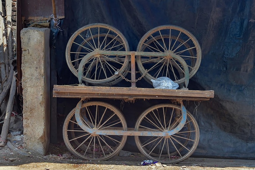 Thane: Carts chained near the residence of a hawker during ongoing COVID-19 lockdown, in Thane, Thursday, April 16, 2020. The 40-day country-wide lockdown may prevent the spread of coronavirus, but the measure would bring a "financial epidemic" on five crore families of hawkers and those who supply them with products, an official of the national hawkers' body said. (PTI Photo/Mitesh Bhuvad) (PTI16-04-2020_000176B)
