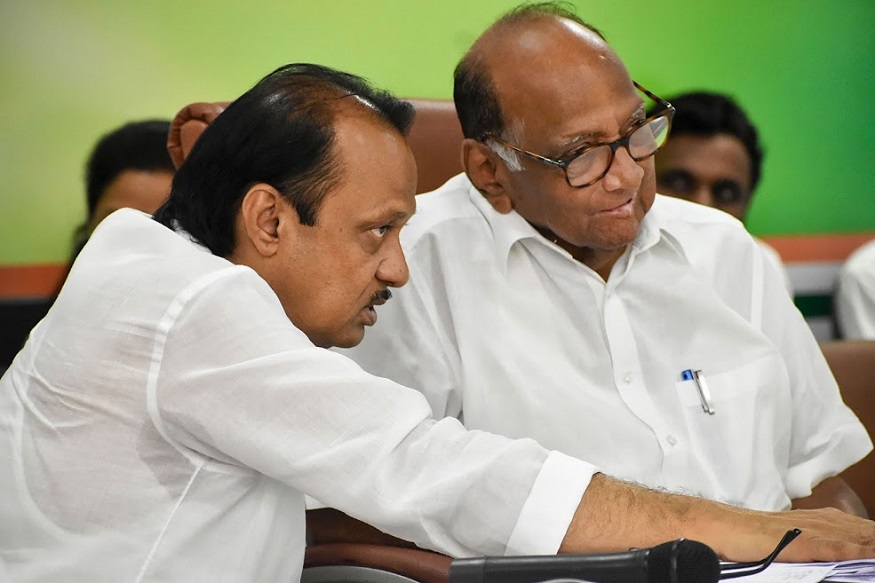 Mumbai: Nationalist Congress President (NCP) Sharad Pawar with party leader Ajit Pawar (L) during a meeting at NCP office, in Mumbai, Sunday, Nov. 3, 2019. (PTI Photo) (PTI11_3_2019_000241B)