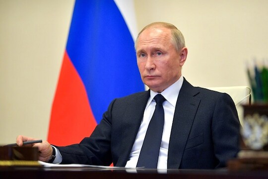 Russian President Vladimir Putin attends a video conference with a cabinet members at the Novo-Ogaryovo residence outside Moscow, Russia, Wednesday, April 15, 2020. Putin has presented an array of new measures to support business, including direct financial aid and state-supported loans. Putin has ordered a partial economic shutdown until April 30 in a bid to stem the outbreak. (Alexei Druzhinin, Sputnik, Kremlin Pool Photo via AP)