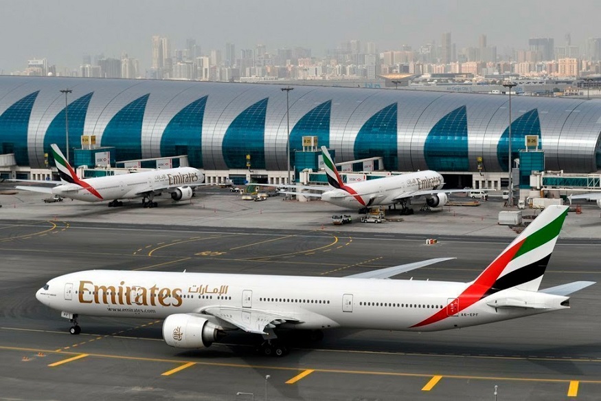 FILE - In this March 22, 2017, file photo, an Emirates plane taxis to a gate at Dubai International Airport in Dubai, United Arab Emirates. The Middle East's biggest airline, Emirates, said Thursday, May 9, 2019, that profits were down almost 70% in the past fiscal year reaching lows of $237 million compared to last year's $762 million. (AP Photo/Adam Schreck, File)