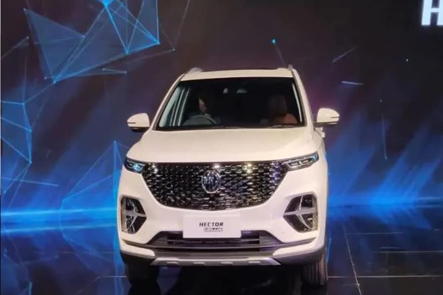 MG Hector Plus: ब्रिटेनची कार निर्माता कंपनी मॉरिस गॅरेज (MG Motor India) ने एसयुव्ही हेक्टरसह भारतीय बाजारपेठेत एंट्री केली होती, आता कंपनी हेक्टर प्लस हे नवीन मॉडेल घेऊन आले आहे. आधीची हेक्टरही 5 सीटर होती. तर आता नवीन हेक्टर प्लसही 6 आणि 7 सीटर व्हर्जनसह असणार आहे. या कारमध्ये BS6 मानकांसह 1.5-litre turbo petrol, 48V mild-hybrid system सह 1.5-litre petrol किंवा 2.0-litre diesel engine मिळणार आहे. MG Hector Plus: ब्रिटेनची कार निर्माता कंपनी मॉरिस गॅरेज (MG Motor India) ने एसयुव्ही हेक्टरसह भारतीय बाजारपेठेत एंट्री केली होती, आता कंपनी हेक्टर प्लस हे नवीन मॉडेल घेऊन आले आहे. आधीची हेक्टरही 5 सीटर होती. तर आता नवीन हेक्टर प्लसही 6 आणि 7 सीटर व्हर्जनसह असणार आहे. या कारमध्ये BS6 मानकांसह 1.5-litre turbo petrol, 48V mild-hybrid system सह 1.5-litre petrol किंवा 2.0-litre diesel engine मिळणार आहे.