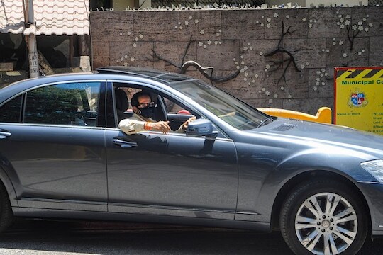 Mumbai: Maharashtra Chief Minister Uddhav Thackeray wearing a mask arrives in his car in wake of coronavirus pandemic, during the nationwide lockdown, at Matoshree in Mumbai, Tuesday, April 7, 2020. (PTI Photo) (PTI07-04-2020_000261B)