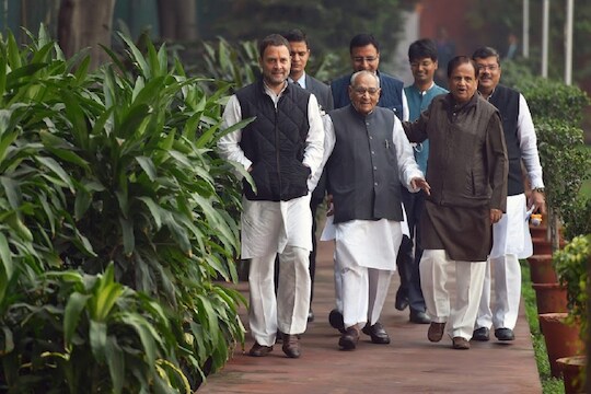 New Delhi: Congress Vice President Rahul Gandhi with party leaders Ahmed Patel and Motilal Vohra arrives to file his nomination papers for the post of party president, at the AICC office in New Delhi on Monday. PTI Photo by Vijay Verma      (PTI12_4_2017_000068B)