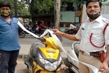 हेल्मेट न घातल्याने पोलिसांनी तरुणाच्या हातात दिलं 2 मीटर लांबीचं चालान