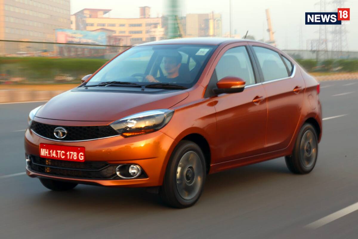 टाटा टिगोर ईव्ही Tata Tigor EV: टाटा टिगोर ईव्ही ही ऑल-इलेक्ट्रिक कॉम्पॅक्ट सेडान असून एक्स-शोरूम दिल्लीतील किंमत 9.58 लाख रुपये आहे. कारमध्ये 21.5 किलोवॅट क्षमतेचं बॅटरी पॅक आणि 72 व्ही 3-फेज एसी इंडक्शन मोटर आहे, ही मोटर 30 केडब्ल्यूची जास्तीत जास्त शक्ती आणि 105 एनएमचा पीक टॉर्क जनरेट करते. टिगोर ईव्ही पूर्ण चार्ज केल्यावर 213 किमी अंतर धावू शकते. टिगोर ईव्ही स्टँडर्ड एसी नॉर्मल चार्जरसह 11.5 तासात फुल चार्ज केली जाऊ शकते. त्याच वेळी 15 किलोवॅट डीसी फास्ट चार्जरसह, 80 टक्के कार चार्ज करण्यासाठी कारला फक्त 2 तास लागतात. टिगोर ईव्हीचा टॉप स्पीड 80 किमी / ताशी आहे. नवीन टाटा टिगोर ईव्ही व्यावसायिक आणि खाजगी दोन्ही ग्राहकांसाठी उपलब्ध आहे. टाटा टिगोर ईव्ही Tata Tigor EV: टाटा टिगोर ईव्ही ही ऑल-इलेक्ट्रिक कॉम्पॅक्ट सेडान असून एक्स-शोरूम दिल्लीतील किंमत 9.58 लाख रुपये आहे. कारमध्ये 21.5 किलोवॅट क्षमतेचं बॅटरी पॅक आणि 72 व्ही 3-फेज एसी इंडक्शन मोटर आहे, ही मोटर 30 केडब्ल्यूची जास्तीत जास्त शक्ती आणि 105 एनएमचा पीक टॉर्क जनरेट करते. टिगोर ईव्ही पूर्ण चार्ज केल्यावर 213 किमी अंतर धावू शकते. टिगोर ईव्ही स्टँडर्ड एसी नॉर्मल चार्जरसह 11.5 तासात फुल चार्ज केली जाऊ शकते. त्याच वेळी 15 किलोवॅट डीसी फास्ट चार्जरसह, 80 टक्के कार चार्ज करण्यासाठी कारला फक्त 2 तास लागतात. टिगोर ईव्हीचा टॉप स्पीड 80 किमी / ताशी आहे. नवीन टाटा टिगोर ईव्ही व्यावसायिक आणि खाजगी दोन्ही ग्राहकांसाठी उपलब्ध आहे.
