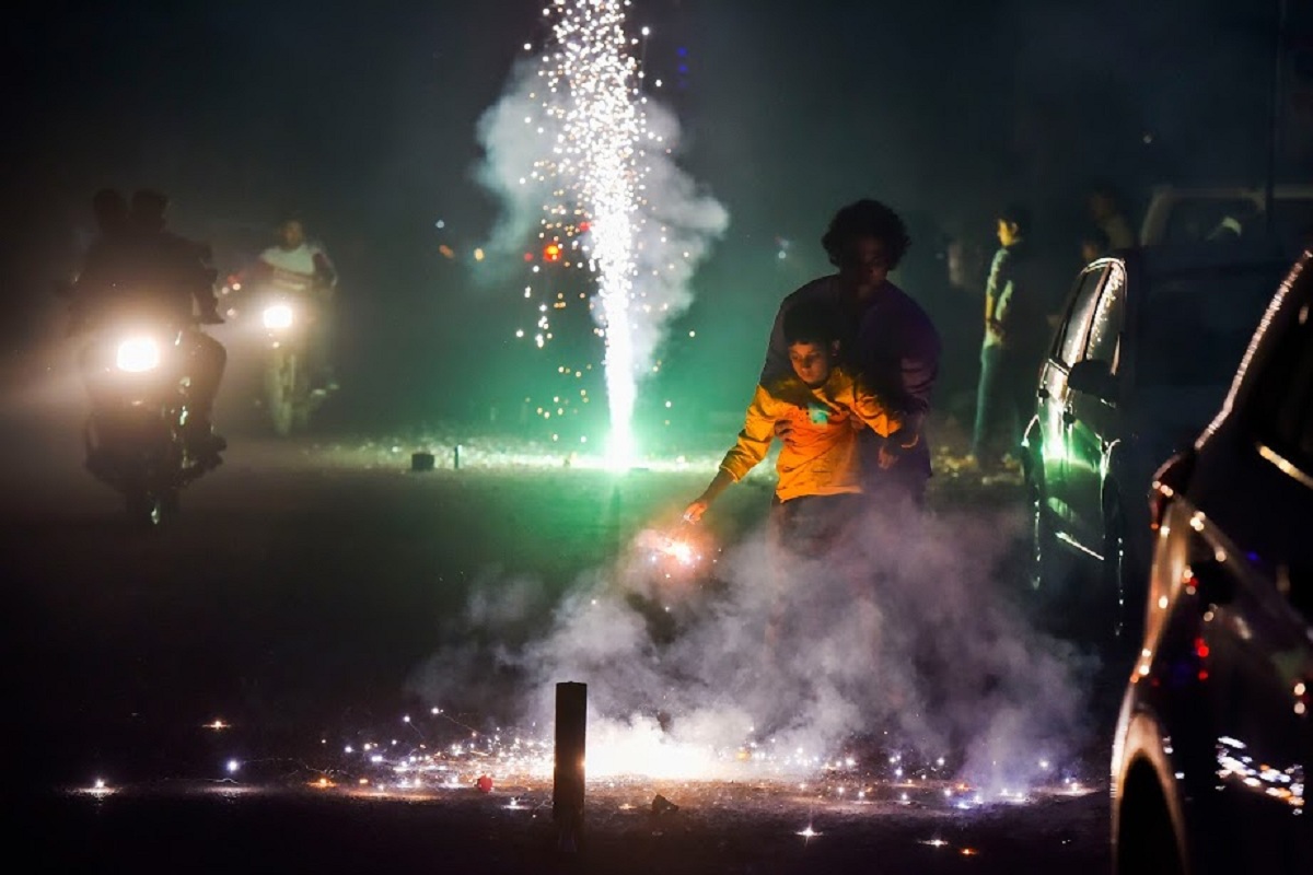 New Delhi: Children burn crackers during 'Diwali' celebrations, in New Delhi, Sunday, Oct. 27, 2019. Delhi had anticipated the season's worst pollution levels in the morning after Diwali, but the air quality, although "very poor", turned out better than the last three years, according to data of the government's air quality monitors. (PTI Photo/Ravi Choudhary)(PTI10_28_2019_000088B)