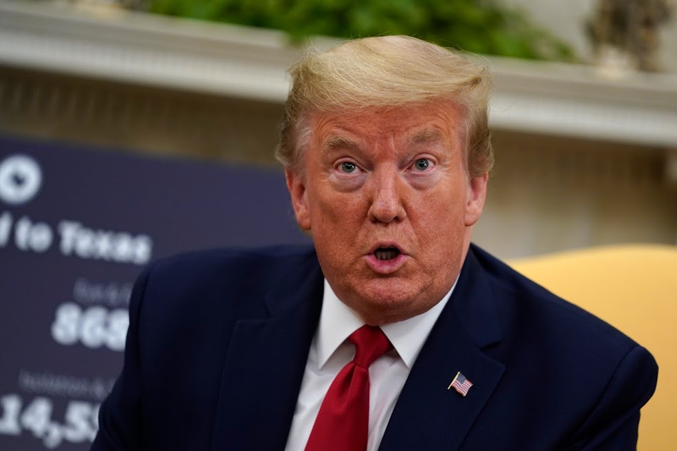 President Donald Trump speaks during a meeting about the coronavirus response with Gov. Greg Abbott, R-Texas, in the Oval Office of the White House, Thursday, May 7, 2020, in Washington. (AP Photo/Evan Vucci)