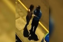 तरुणीने कोरोनाचे नियम तोडले; पोलिसाने शिक्षा न देता Kiss करुन सोडलं