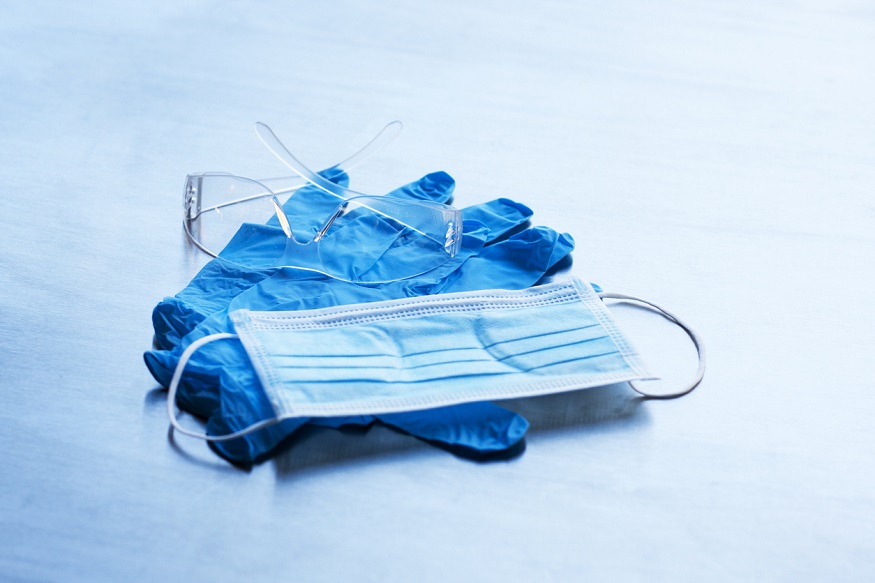 A contaigen mask, a pair of nitrile gloves, and a pair of safety glasses.  All things need to protect yourself from communicable diseases.