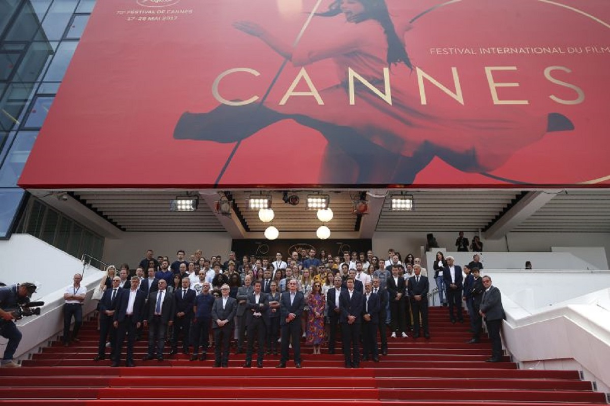 Mandatory Credit: Photo by SEBASTIEN NOGIER/EPA/REX/Shutterstock (8835352g)
Thierry Fremaux, Pierre Lescure and Isabelle Huppert
Features - 70th Cannes Film Festival, France - 23 May 2017
(Front L-R) General Delegate of the Cannes Film Festival Thierry Fremaux, Mayor of Cannes David Lisnard, Cannes Festival President Pierre Lescure, French actress Isabelle Huppert and staff members hold a minute of silence to pay tribute to the victims of the Manchester terror attack during the 70th Anniversary of the Festival photocall at the 70th annual Cannes Film Festival, in Cannes, France, 23 May 2017. The festival runs from 17 to 28 May.
