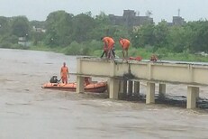 पुरातील मनोरुग्णाची तीन तासांच्या थरारानंतर SDRF कडून सुटका, पाहा Photos
