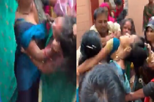 VIDEO - बापरे! कोरोना लशीसाठी झिंझ्या उपटल्या, जमिनीवर आपटलं; एकमेकींच्या जीवावर उठल्या महिला