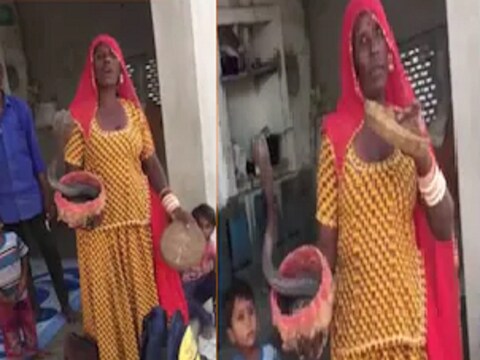 कोरोना लस द्यायला आलेल्या वैद्यकीय टीमला महिलेने दाखवला कोब्रा सापाची भीती.