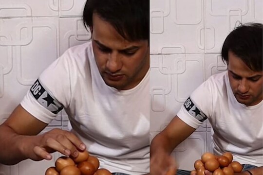 OMG! तळहाताच्या मागील बाजूवर ठेवली इतकी अंडी की बनवलं वर्ल्ड रेकॉर्ड, पाहा अनोखा VIDEO