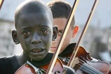 डोळ्यात अश्रू अन् हातात Violin असलेल्या चिमुकल्याचा Photo व्हायरल;भावनिक आहे कथा डोळ्यात अश्रू अन् हातात Violin असलेल्या चिमुकल्याचा Photo व्हायरल;भावनिक आहे कथा
