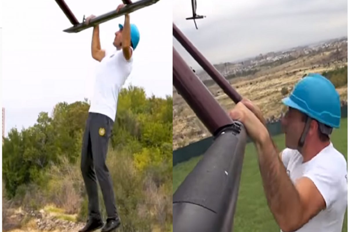 OMG! उडत्या हेलिकॉप्टरला लटकून तरुणाचं Pull ups; World record साठी खतरनाक Stunt video
