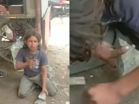 व्हिडिओमध्ये तुम्ही बघू शकता की अनेक लोक एकत्र बसलेले आहेत, तेवढ्यात एक व्यक्ती येऊन तिथे बसलेल्या व्यक्तीकडून दोन दगड घेतो आणि मग तो जमिनीवर बसतो. 