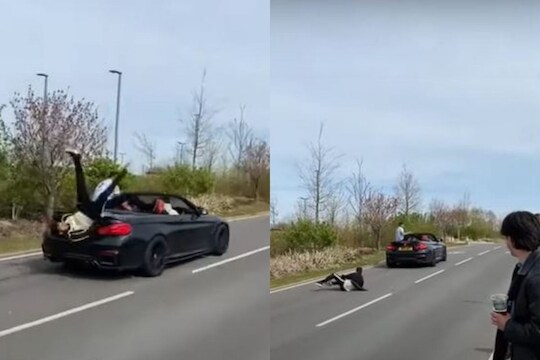 दिखाव्याच्या नादात तरुणासोबत भलतंच घडलं; BMW मधून पडून थेट रस्त्यावर आपटला, पाहा VIDEO