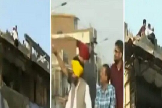 VIDEO: केजरीवालांची रॅली पाहताना छतावर उभ्या तरुणानं केला असा 'पराक्रम'; लोकांनी कसंबसं वाचवलं