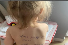 मुलीच्या पाठीवर लिहावा लागला पत्ता,युक्रेनमधून समोर आला मन हेलावून टाकणारा PHOTO